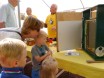 Imkervereniging - infokraam met demonstratiekastje bijen